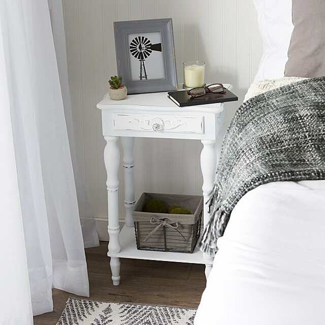 small white bedside table